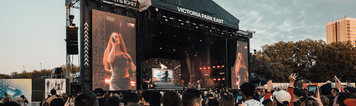 A crowd at the main stage at All Points East watching an artist in the day time