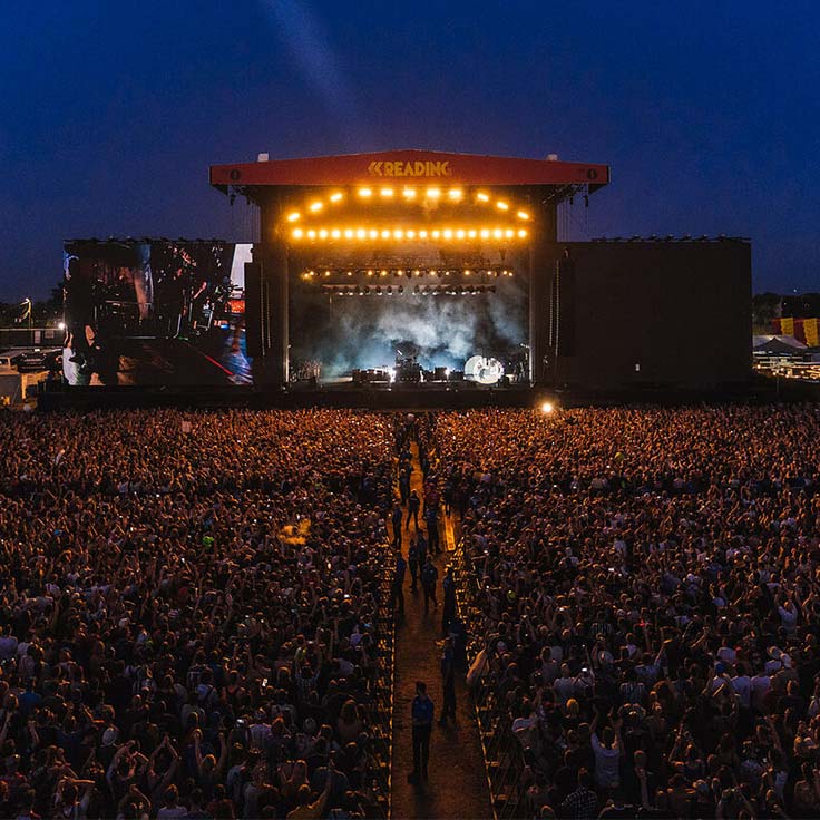 Reading Festival headliner at night performing