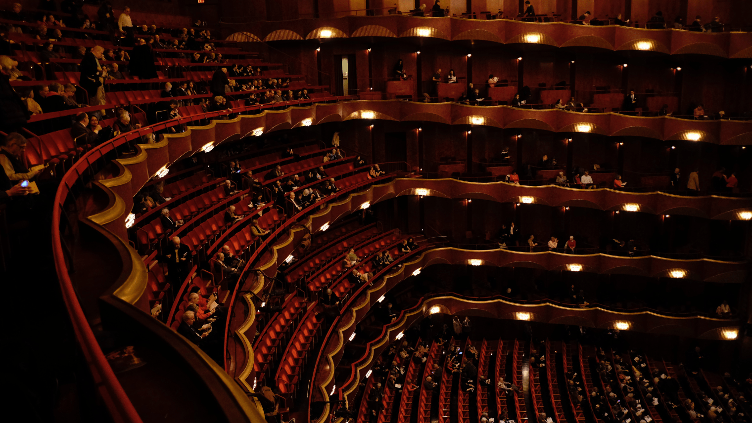 An inside view of the Royal Albert Hall, with people at their seats