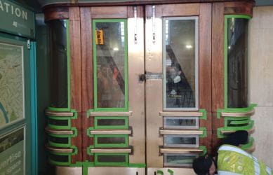 The bronze clad entrance doors during the restoration at Richmond station - South Western Railway