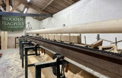 The new flag poles for Richmond station being turned on a 9m long lathe - South Western Railway