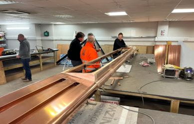The new bronze canopy fascia for Richmond Station being crafted in the workshop - South Western Railway