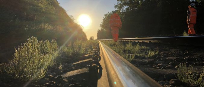 Extreme Hot Weather - picture of railway track with the sun in the background
