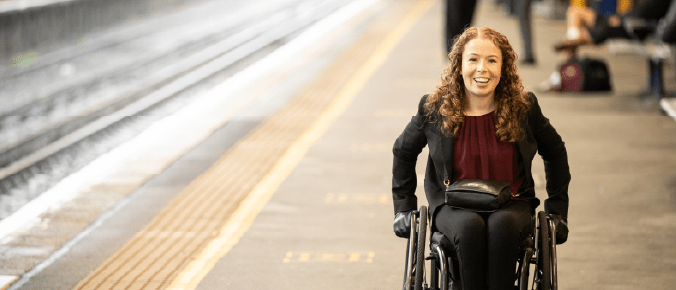 Disable person in a train platform