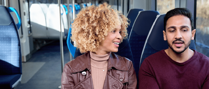 couple sit in the train