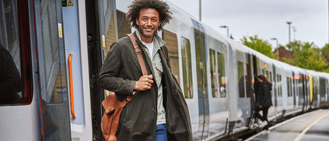 Happy guy go out f the train
