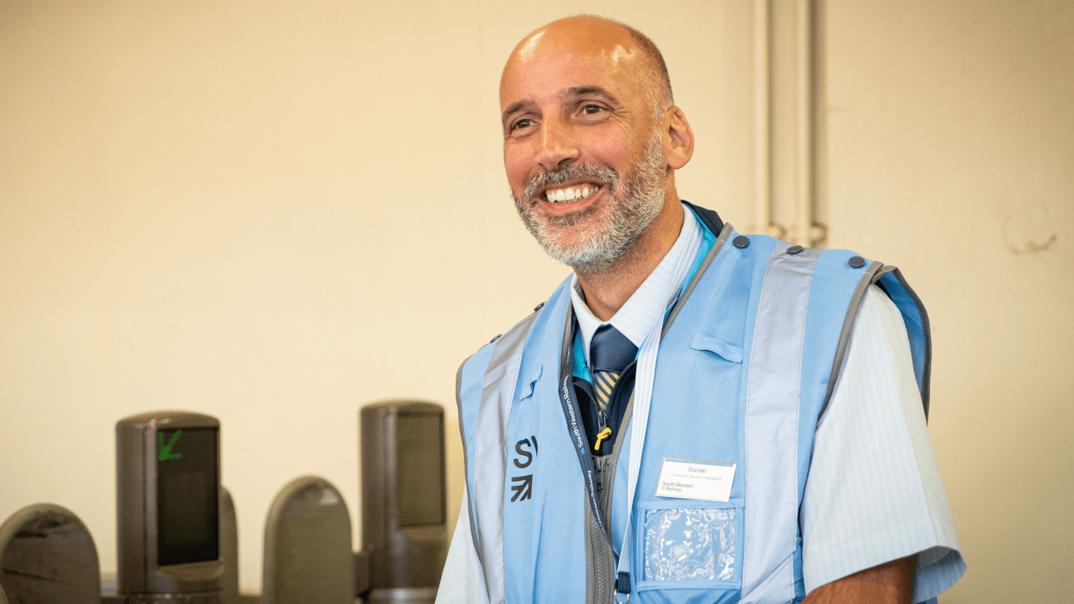 person in front of train gate