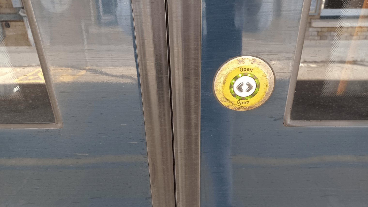 button on the door of the train