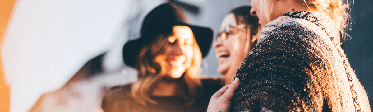3 women laughing 