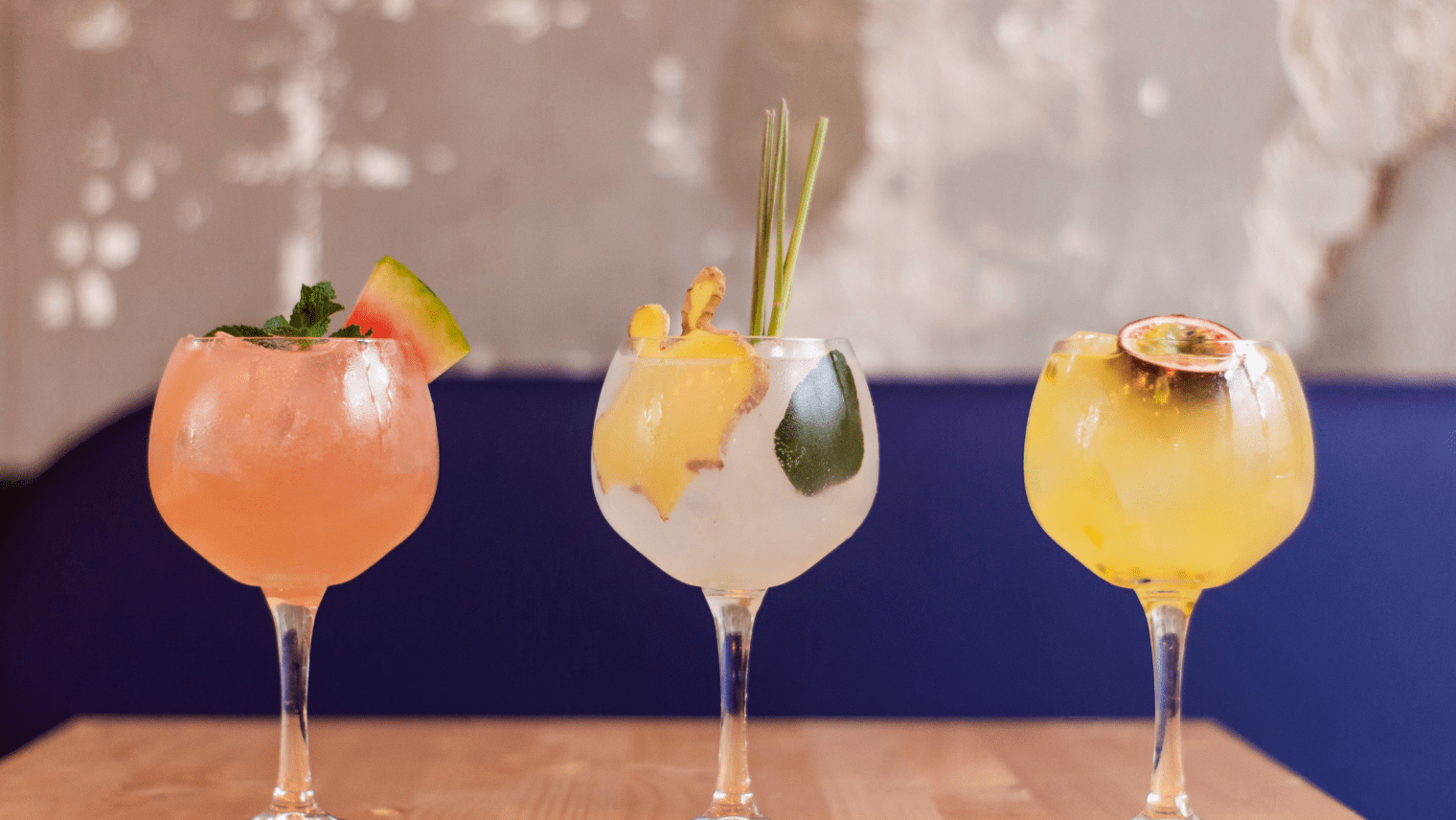 Image of 3 gin cocktails side by side on a table 