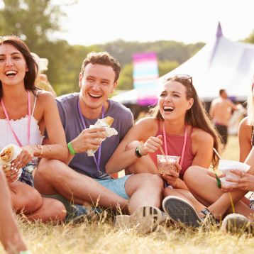 A group of friends at a festival I South Western Railway