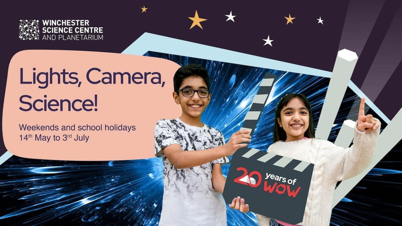 Children holding a clapper board
