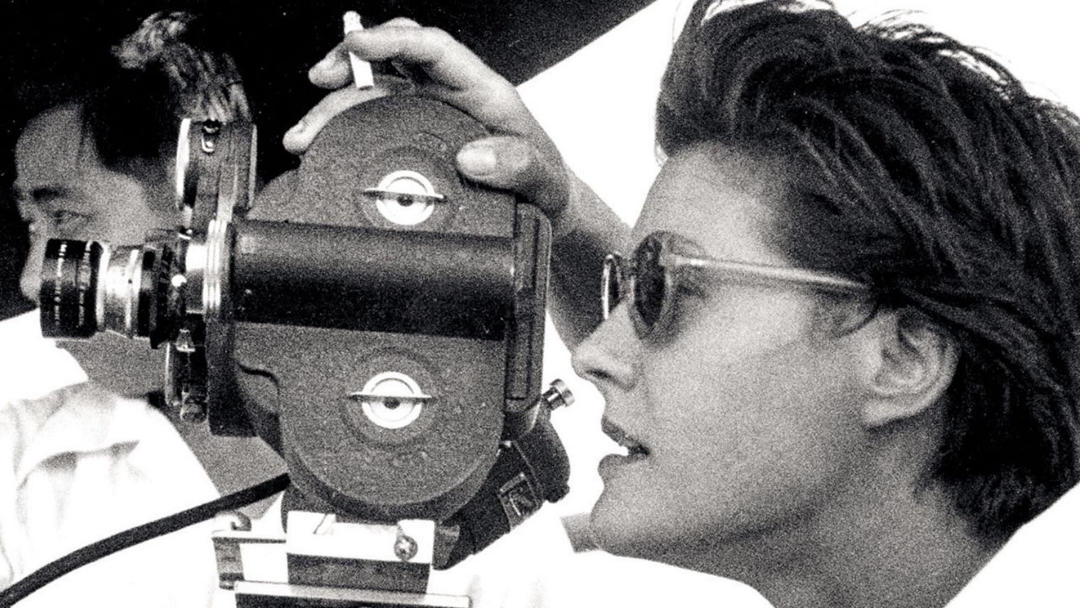 Documentary producer Kay Mander at her camera