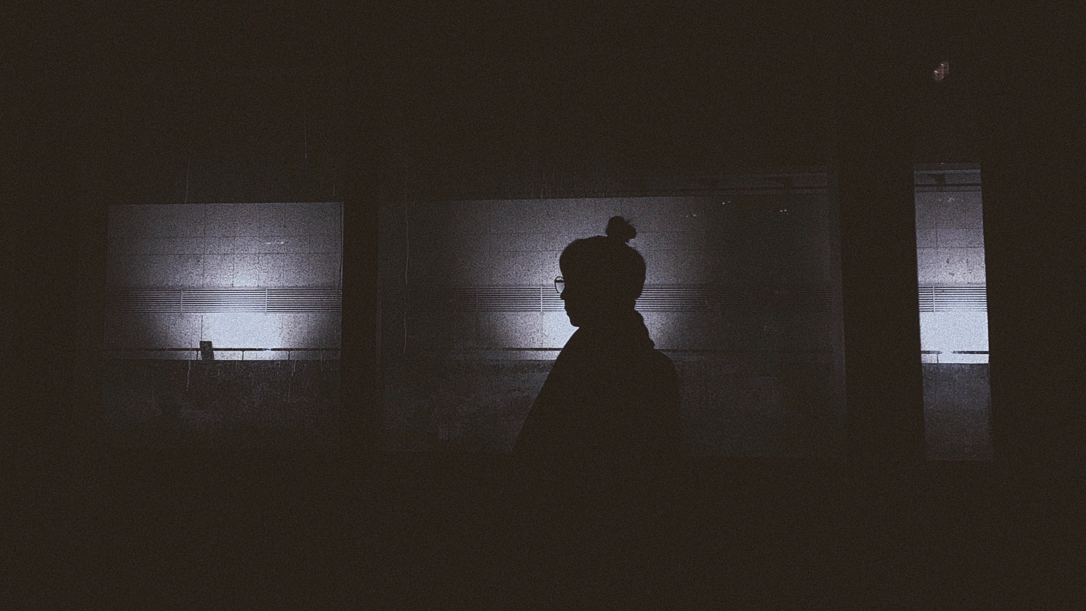 Black and white image of a female's shadow
