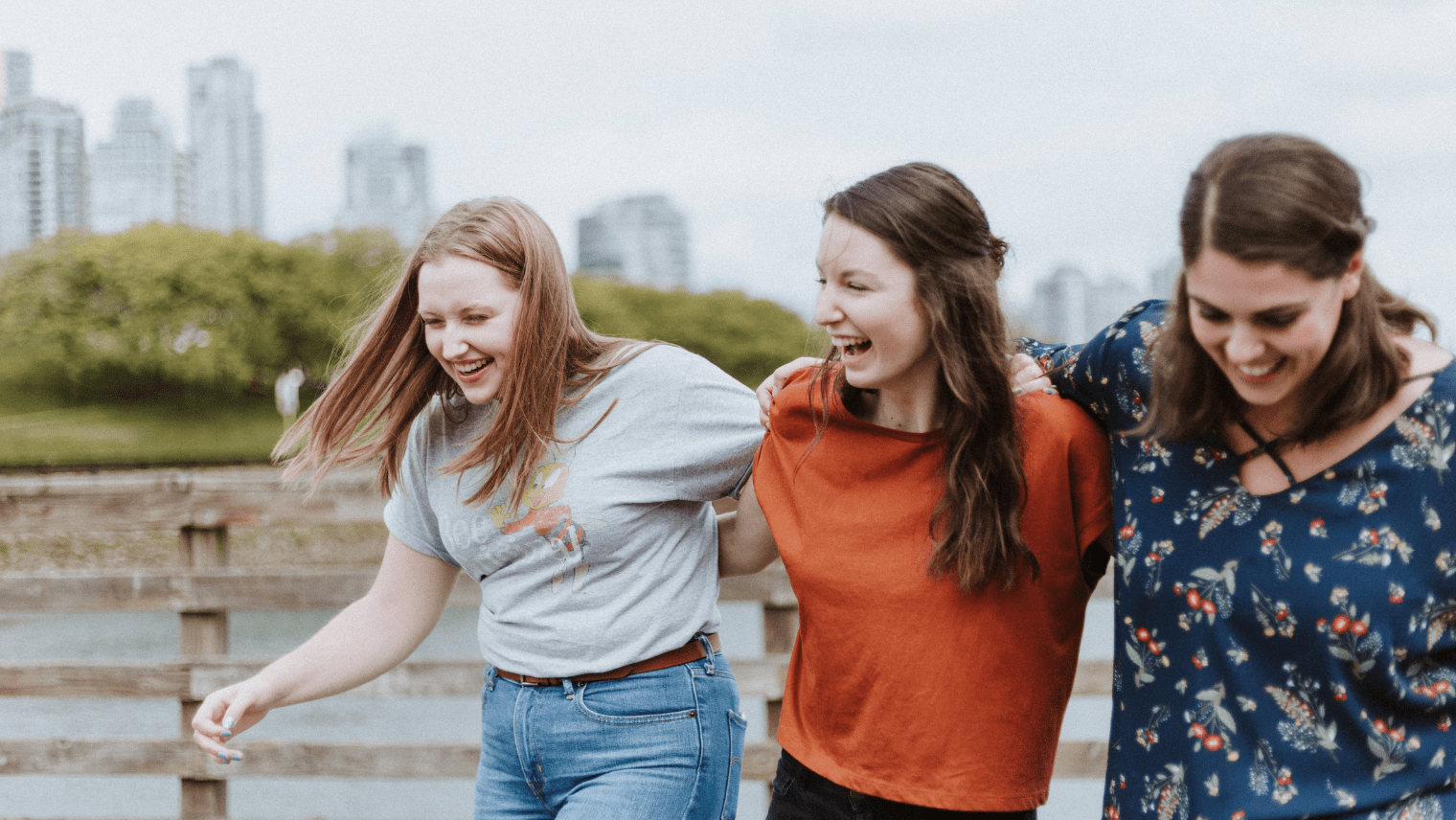 3 female friends walking outdoors