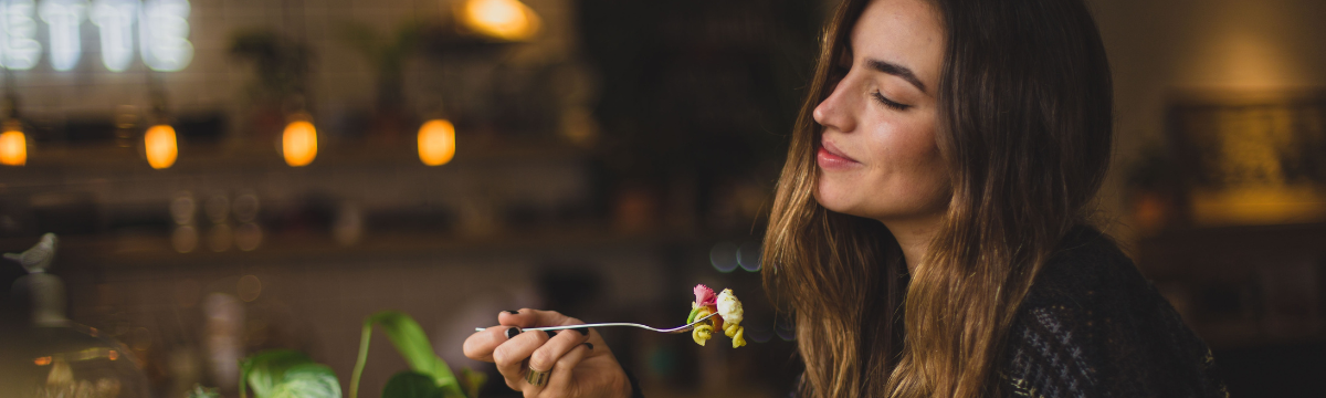 girl eating in a restaurant