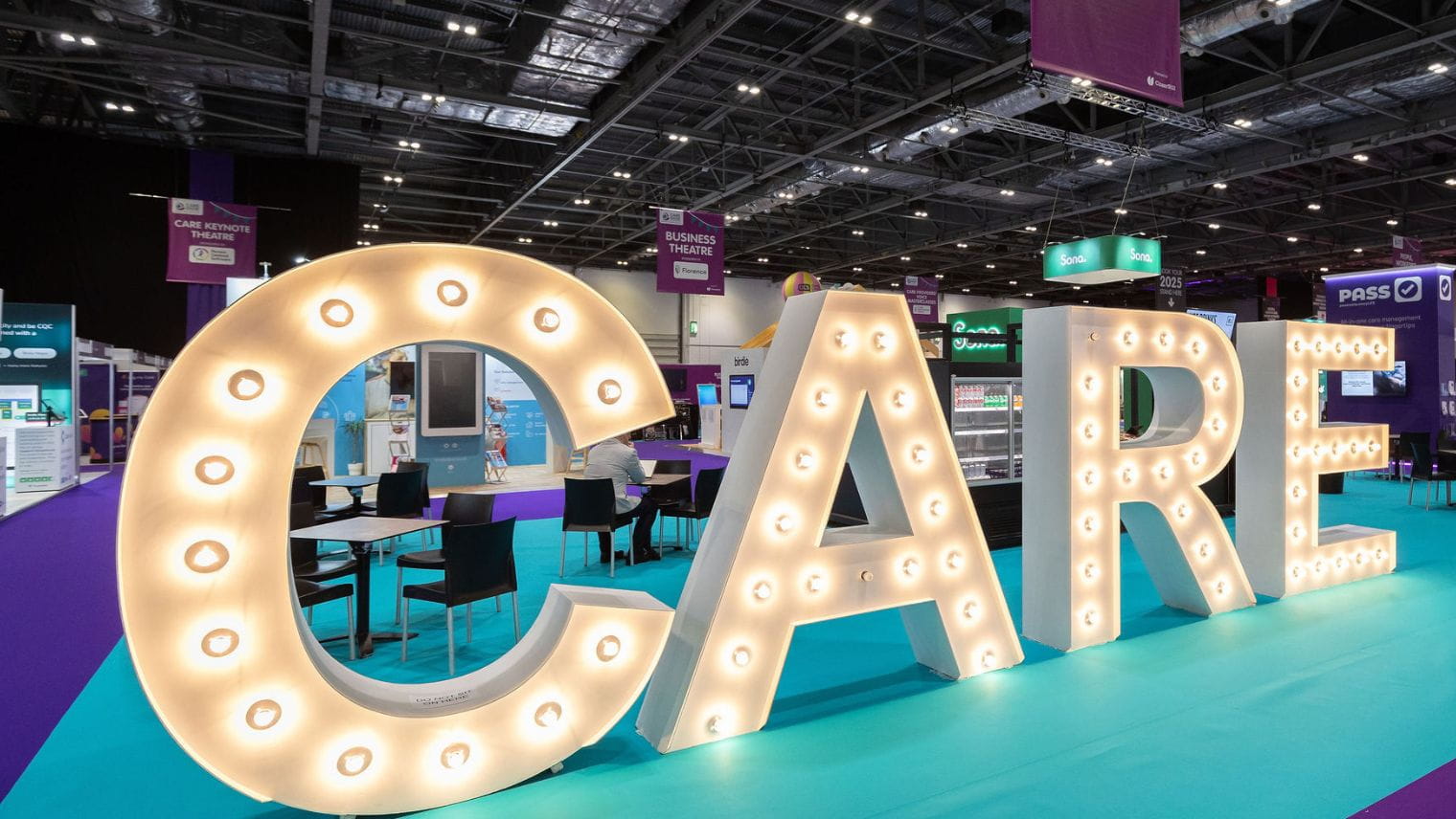 CARE sign at care show business expo