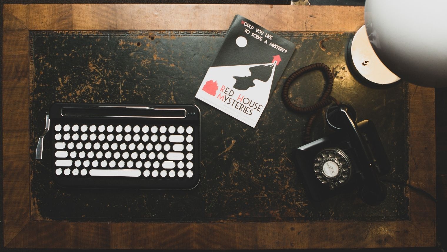 Desk with escape room equipment at Red Rooms, Exeter