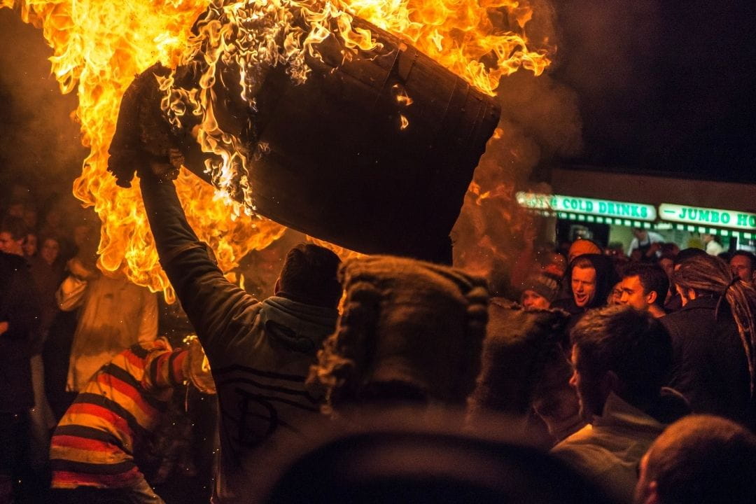 Carrying a flaming tar barrel at Ottery St Mary